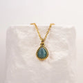 Sera Teardrop Pendant Necklace gold on model layered view — Tamola Jewellery