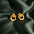 Riva Sculptural Knot Earrings gold close-up detail — Tamola Jewellery