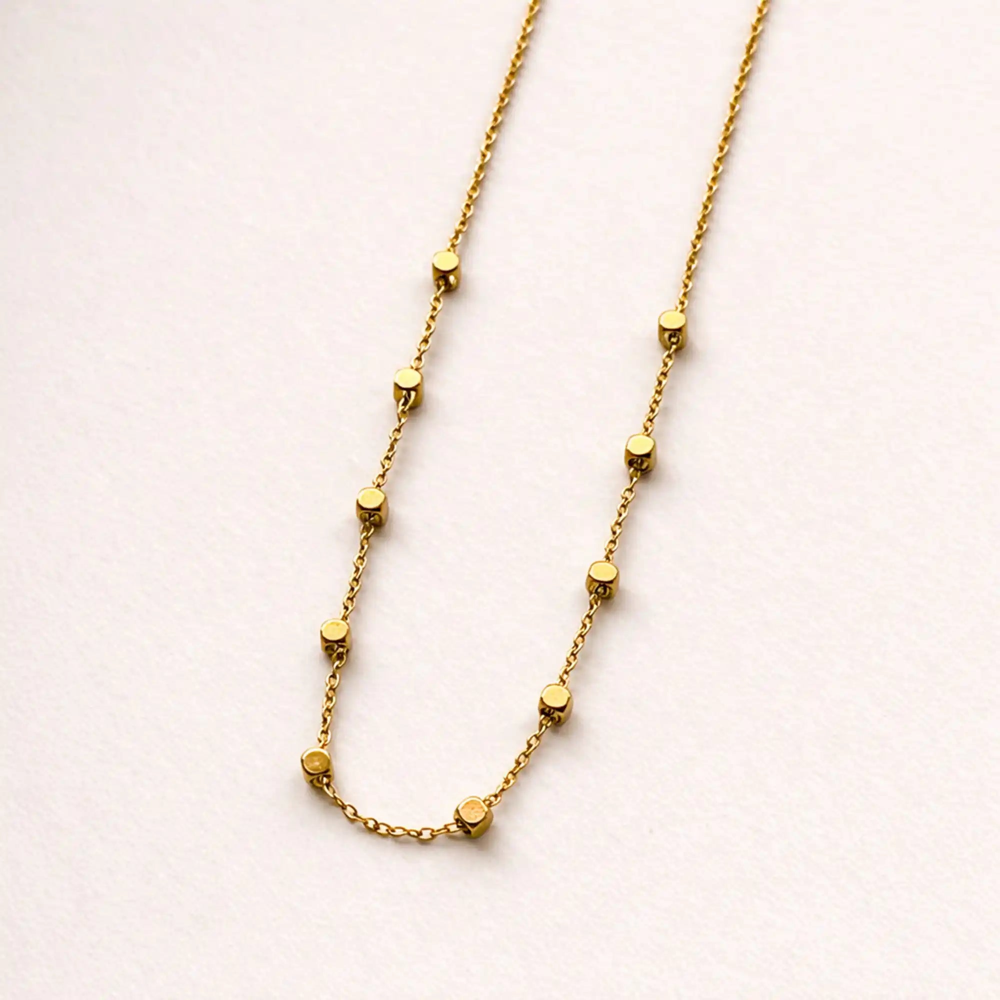 Arla Gold Cube Chain Necklace close-up cube detail — Tamola Jewellery