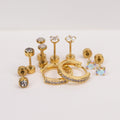 Lumiere Piercing Stack zircon studs and hoops gold stainless steel — Tamola Jewellery