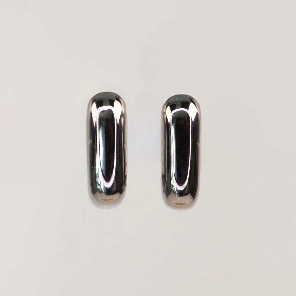 Solene Sculptural Huggie Earrings silver side view — Tamola Jewellery