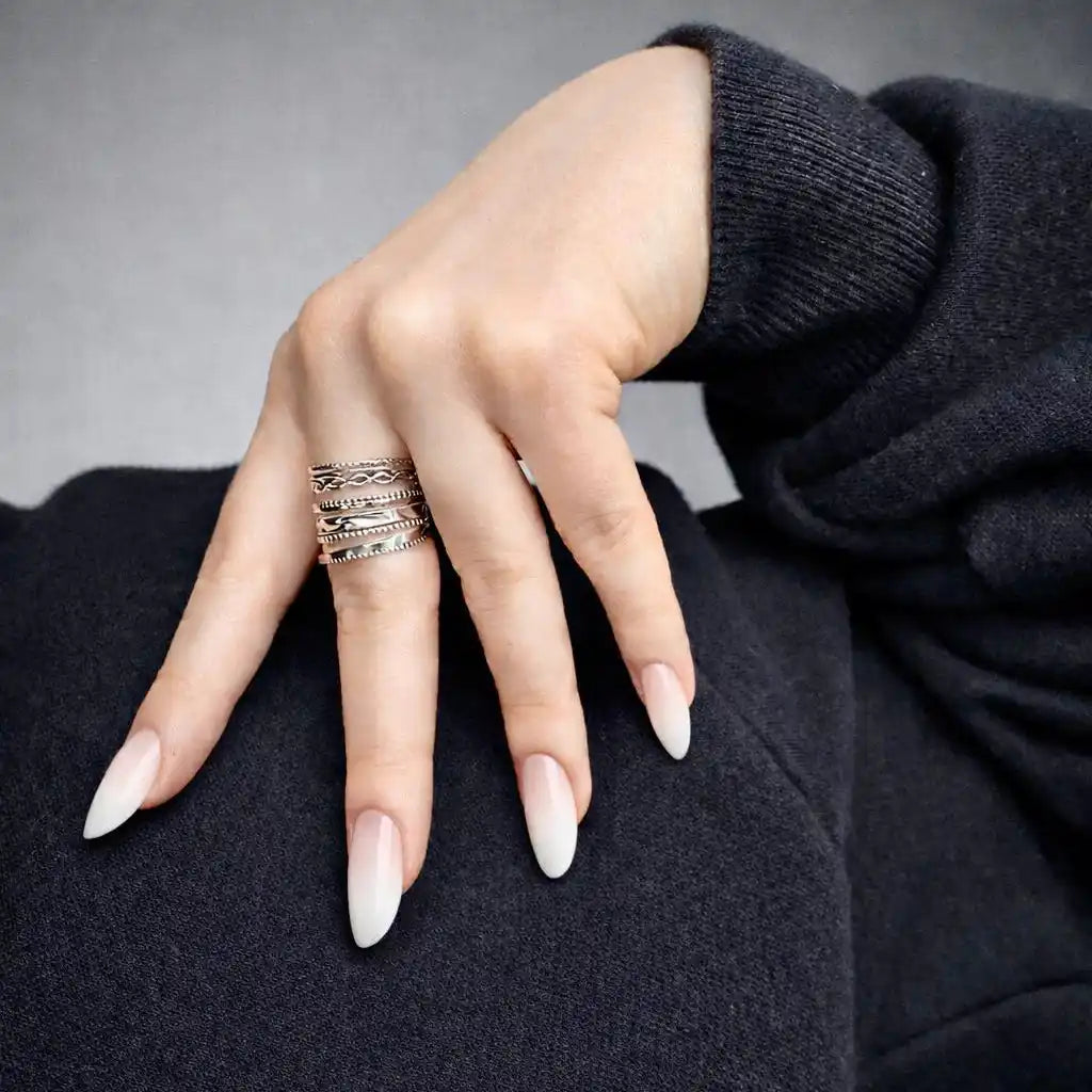 Sora Adjustable Steel Ring silver on model hand — Tamola Jewellery